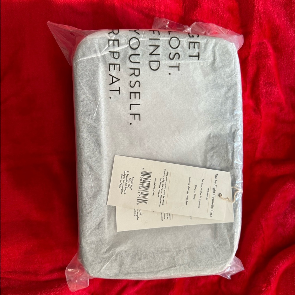 In flight cosmetic pouch set with mirror